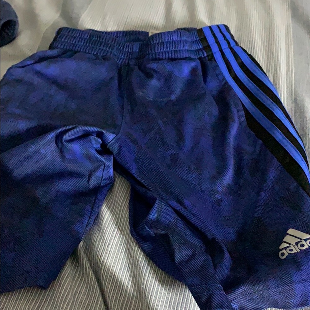 Adidas shorts size M (10-12) blue with stripes